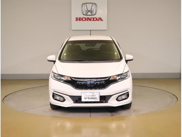 フィットハイブリッド Lホンダセンシング 軽減ブレーキ Rカメ LED サイドSRS 横滑り防止 ドライブレコーダー フルセグテレビ ナビTV パワーステアリング 盗難防止装置 オートクルーズ ETC車載器 DVD再生(2枚目)