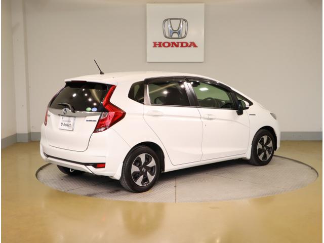 フィットハイブリッド Lホンダセンシング 軽減ブレーキ Rカメ LED サイドSRS 横滑り防止 ドライブレコーダー フルセグテレビ ナビTV パワーステアリング 盗難防止装置 オートクルーズ ETC車載器 DVD再生(7枚目)