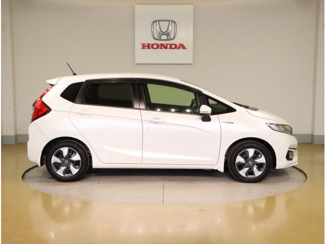 フィットハイブリッド Lホンダセンシング 軽減ブレーキ Rカメ LED サイドSRS 横滑り防止 ドライブレコーダー フルセグテレビ ナビTV パワーステアリング 盗難防止装置 オートクルーズ ETC車載器 DVD再生(8枚目)