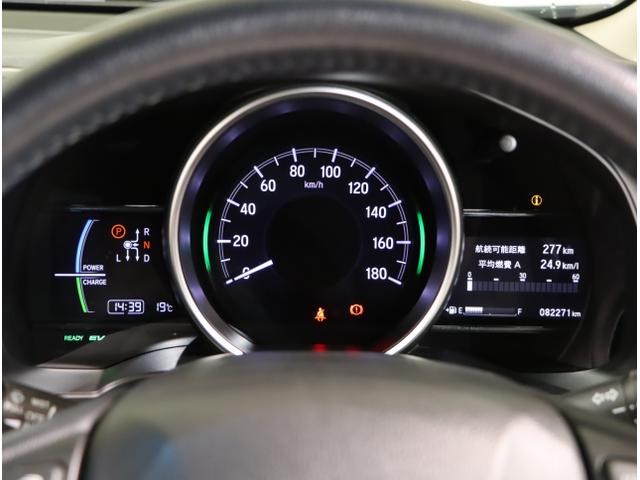 フィットハイブリッド Lホンダセンシング 軽減ブレーキ Rカメ LED サイドSRS 横滑り防止 ドライブレコーダー フルセグテレビ ナビTV パワーステアリング 盗難防止装置 オートクルーズ ETC車載器 DVD再生(16枚目)