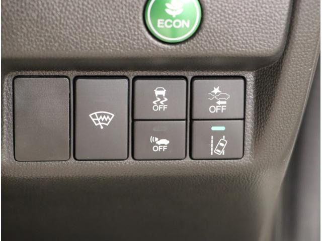 フィットハイブリッド Lホンダセンシング 軽減ブレーキ Rカメ LED サイドSRS 横滑り防止 ドライブレコーダー フルセグテレビ ナビTV パワーステアリング 盗難防止装置 オートクルーズ ETC車載器 DVD再生(29枚目)