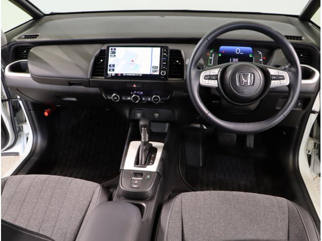 フィット e:HEVホーム 前後誤発進抑制機能 助手席エアバッグ 運転席エアバッグ アイドリングストップ LEDライト USB接続 バックカメラ ABS サイドエアバッグ オートクルーズコントロール DVD再生(14枚目)