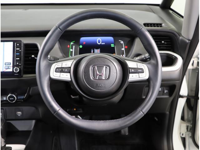 フィット e:HEVホーム 前後誤発進抑制機能 助手席エアバッグ 運転席エアバッグ アイドリングストップ LEDライト USB接続 バックカメラ ABS サイドエアバッグ オートクルーズコントロール DVD再生(15枚目)