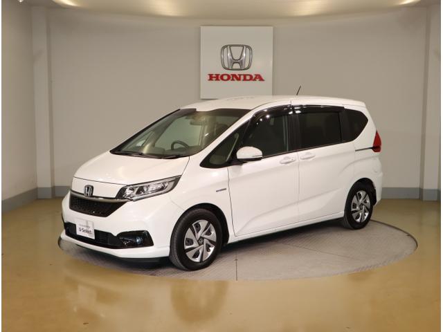 フリードハイブリッド ハイブリッド・Gホンダセンシング 軽減ブレーキ キーフリーシステム DVD再生可能 ECON 後カメラ Aクルーズ 地デジフルセグTV LEDヘッドランプ シートH 横滑防止 パワーウインドウ ABS(3枚目)