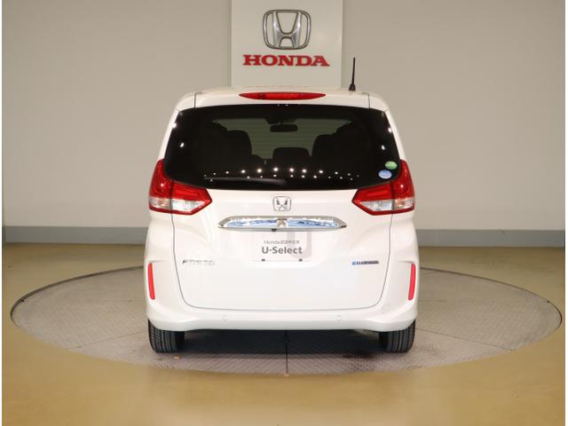 フリードハイブリッド ハイブリッド・Gホンダセンシング 軽減ブレーキ キーフリーシステム DVD再生可能 ECON 後カメラ Aクルーズ 地デジフルセグTV LEDヘッドランプ シートH 横滑防止 パワーウインドウ ABS(6枚目)