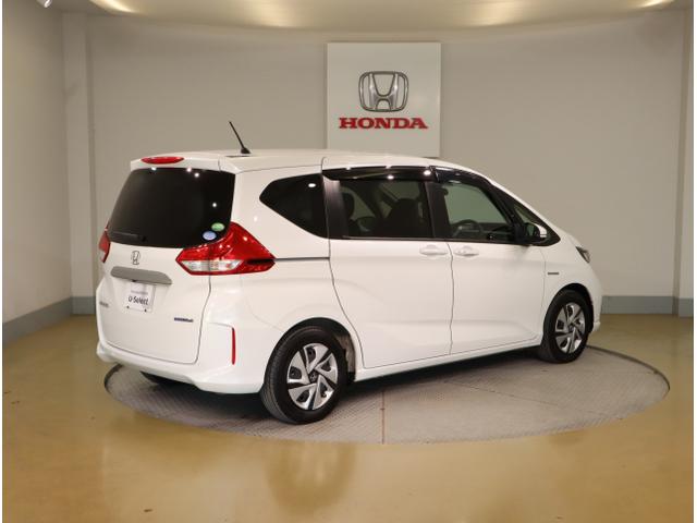 フリードハイブリッド ハイブリッド・Gホンダセンシング 軽減ブレーキ キーフリーシステム DVD再生可能 ECON 後カメラ Aクルーズ 地デジフルセグTV LEDヘッドランプ シートH 横滑防止 パワーウインドウ ABS(7枚目)