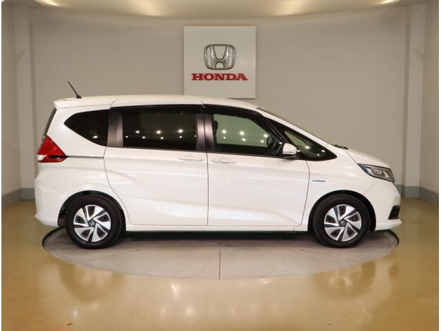 フリードハイブリッド ハイブリッド・Gホンダセンシング 軽減ブレーキ キーフリーシステム DVD再生可能 ECON 後カメラ Aクルーズ 地デジフルセグTV LEDヘッドランプ シートH 横滑防止 パワーウインドウ ABS(8枚目)