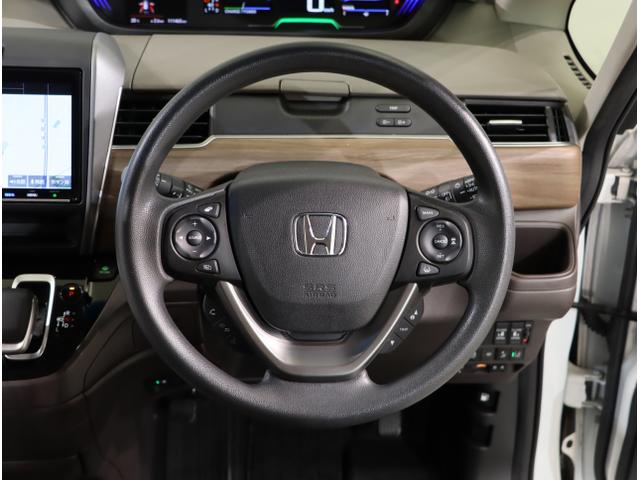 フリードハイブリッド ハイブリッド・Gホンダセンシング 軽減ブレーキ キーフリーシステム DVD再生可能 ECON 後カメラ Aクルーズ 地デジフルセグTV LEDヘッドランプ シートH 横滑防止 パワーウインドウ ABS(15枚目)