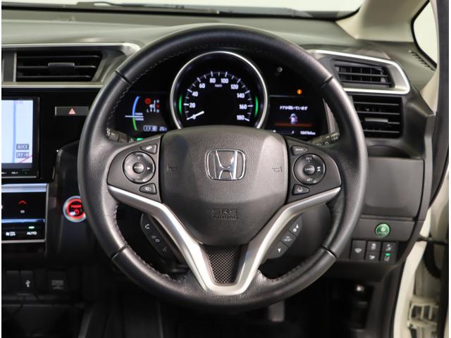 フィットハイブリッド Ｌホンダセンシング　軽減ブレーキ　Ｒカメ　ＬＥＤ　サイドＳＲＳ　横滑り防止　ドライブレコーダー　フルセグテレビ　ナビＴＶ　パワーステアリング　盗難防止装置　オートクルーズ　ＥＴＣ車載器　ＤＶＤ再生（15枚目）