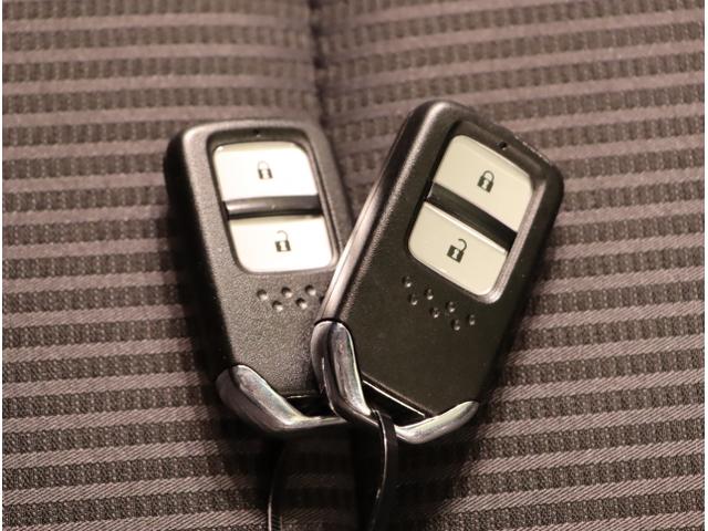 フィットハイブリッド Ｌホンダセンシング　軽減ブレーキ　Ｒカメ　ＬＥＤ　サイドＳＲＳ　横滑り防止　ドライブレコーダー　フルセグテレビ　ナビＴＶ　パワーステアリング　盗難防止装置　オートクルーズ　ＥＴＣ車載器　ＤＶＤ再生（26枚目）