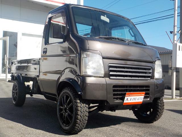 キャリイトラック KC 4WD エアコン パワステ 2インチリフトアップ 14インチアルミホイール・新品マッドタイヤ 社外マフラー LEDテール・バックランプ 革調シートカバー コンビステアリング アイライン(2枚目)