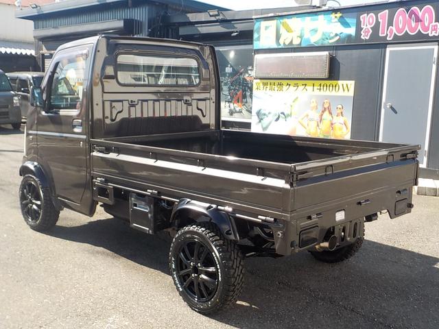 キャリイトラック KC 4WD エアコン パワステ 2インチリフトアップ 14インチアルミホイール・新品マッドタイヤ 社外マフラー LEDテール・バックランプ 革調シートカバー コンビステアリング アイライン(6枚目)