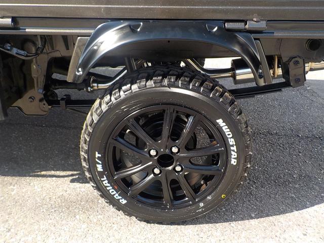 キャリイトラック KC 4WD エアコン パワステ 2インチリフトアップ 14インチアルミホイール・新品マッドタイヤ 社外マフラー LEDテール・バックランプ 革調シートカバー コンビステアリング アイライン(13枚目)