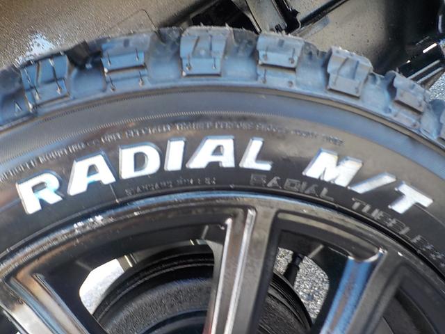 キャリイトラック KC 4WD エアコン パワステ 2インチリフトアップ 14インチアルミホイール・新品マッドタイヤ 社外マフラー LEDテール・バックランプ 革調シートカバー コンビステアリング アイライン(15枚目)