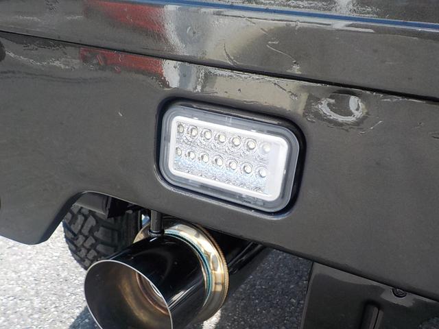 キャリイトラック KC 4WD エアコン パワステ 2インチリフトアップ 14インチアルミホイール・新品マッドタイヤ 社外マフラー LEDテール・バックランプ 革調シートカバー コンビステアリング アイライン(28枚目)