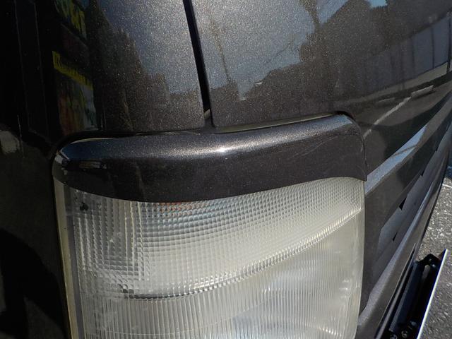 キャリイトラック KC 4WD エアコン パワステ 2インチリフトアップ 14インチアルミホイール・新品マッドタイヤ 社外マフラー LEDテール・バックランプ 革調シートカバー コンビステアリング アイライン(29枚目)