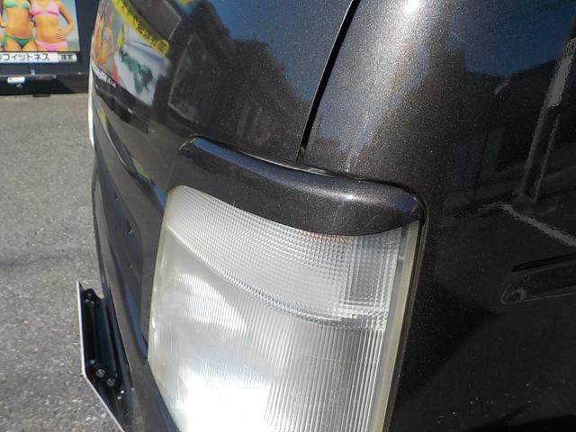 キャリイトラック KC 4WD エアコン パワステ 2インチリフトアップ 14インチアルミホイール・新品マッドタイヤ 社外マフラー LEDテール・バックランプ 革調シートカバー コンビステアリング アイライン(30枚目)