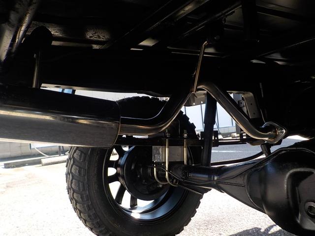 キャリイトラック KC 4WD エアコン パワステ 2インチリフトアップ 14インチアルミホイール・新品マッドタイヤ 社外マフラー LEDテール・バックランプ 革調シートカバー コンビステアリング アイライン(33枚目)