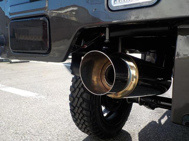 キャリイトラック KC 4WD エアコン パワステ 2インチリフトアップ 14インチアルミホイール・新品マッドタイヤ 社外マフラー LEDテール・バックランプ 革調シートカバー コンビステアリング アイライン(34枚目)