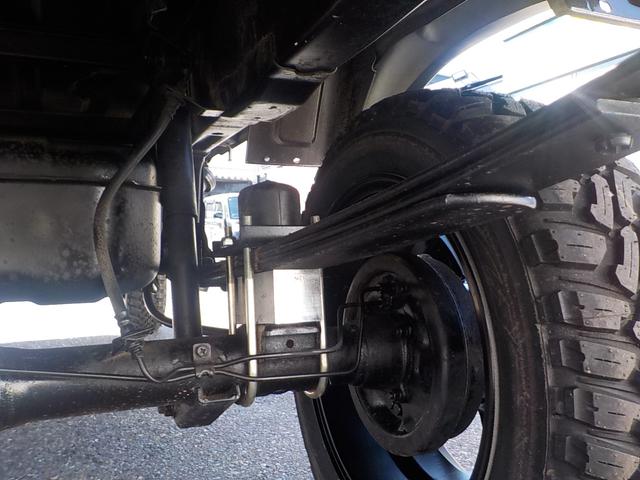 キャリイトラック KC 4WD エアコン パワステ 2インチリフトアップ 14インチアルミホイール・新品マッドタイヤ 社外マフラー LEDテール・バックランプ 革調シートカバー コンビステアリング アイライン(35枚目)