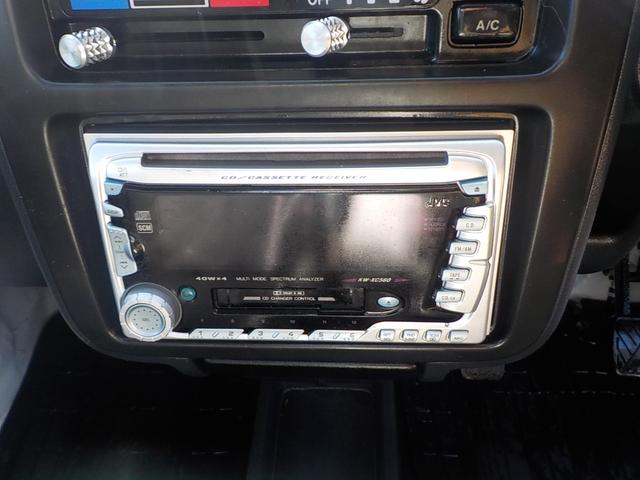 キャリイトラック KC 4WD エアコン パワステ 2インチリフトアップ 14インチアルミホイール・新品マッドタイヤ 社外マフラー LEDテール・バックランプ 革調シートカバー コンビステアリング アイライン(39枚目)