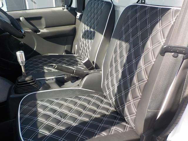 キャリイトラック KC 4WD エアコン パワステ 2インチリフトアップ 14インチアルミホイール・新品マッドタイヤ 社外マフラー LEDテール・バックランプ 革調シートカバー コンビステアリング アイライン(41枚目)