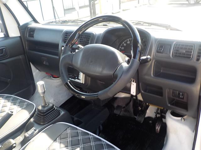 キャリイトラック KC 4WD エアコン パワステ 2インチリフトアップ 14インチアルミホイール・新品マッドタイヤ 社外マフラー LEDテール・バックランプ 革調シートカバー コンビステアリング アイライン(52枚目)