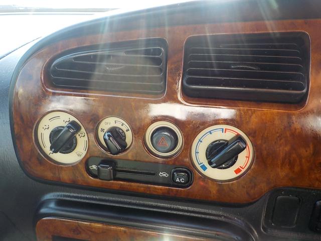 ミラジーノ ジーノ　２ＷＤ　オートマ　フル装備　純正ルーフキャリア　ヘッドライトバイザー　フェンダーミラー　シートカバー　社外フロントグリル・ウインカー・マフラー・フォグランプ　ＨＡＫアーモンドグリーンオールペイント済み（35枚目）