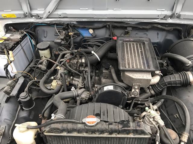 ジムニー ランドベンチャー　ＡＣ　ＰＳ　ＡＴ　リフトアップ　最終型改造公認車　前後社外バンパー　社外ＡＷ　ＭＴタイヤ　純正ＯＰモモハン　純正ＯＰサイホーンＢ　純正ＯＰクォーツ時計　　ＲＥＣＡＲＯシート　１型グリル　ＣＤオーディオ（58枚目）