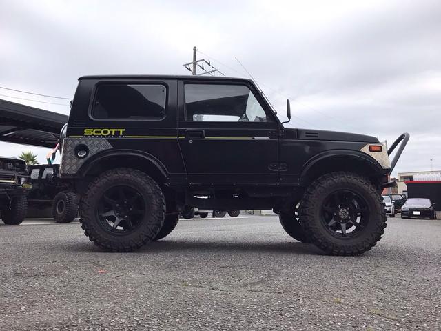 ジムニー スコットリミテッド AC PS 5MT 純正色 社外リーフリフトアップ 改造公認車 R3年小型貨物登録車 社外前後バンパーシシ狩りバンパー大 社外タンクガード 社外マフラー 社外ハンドル 社外AW MTタイヤ 社外ノブ(10枚目)