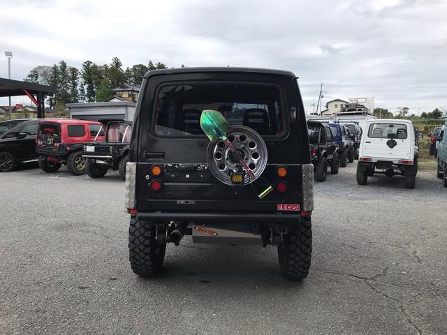 ジムニー スコットリミテッド AC PS 5MT 純正色 社外リーフリフトアップ 改造公認車 R3年小型貨物登録車 社外前後バンパーシシ狩りバンパー大 社外タンクガード 社外マフラー 社外ハンドル 社外AW MTタイヤ 社外ノブ(14枚目)