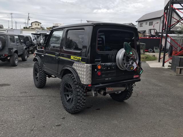 ジムニー スコットリミテッド AC PS 5MT 純正色 社外リーフリフトアップ 改造公認車 R3年小型貨物登録車 社外前後バンパーシシ狩りバンパー大 社外タンクガード 社外マフラー 社外ハンドル 社外AW MTタイヤ 社外ノブ(16枚目)