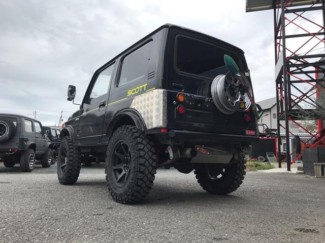 ジムニー スコットリミテッド AC PS 5MT 純正色 社外リーフリフトアップ 改造公認車 R3年小型貨物登録車 社外前後バンパーシシ狩りバンパー大 社外タンクガード 社外マフラー 社外ハンドル 社外AW MTタイヤ 社外ノブ(17枚目)