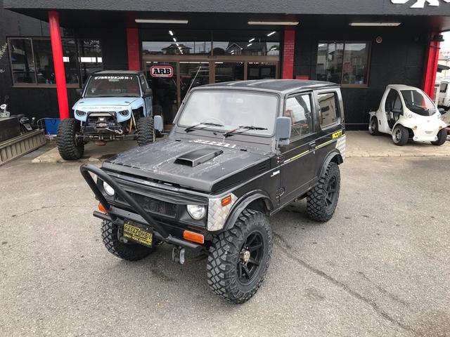 ジムニー スコットリミテッド AC PS 5MT 純正色 社外リーフリフトアップ 改造公認車 R3年小型貨物登録車 社外前後バンパーシシ狩りバンパー大 社外タンクガード 社外マフラー 社外ハンドル 社外AW MTタイヤ 社外ノブ(23枚目)