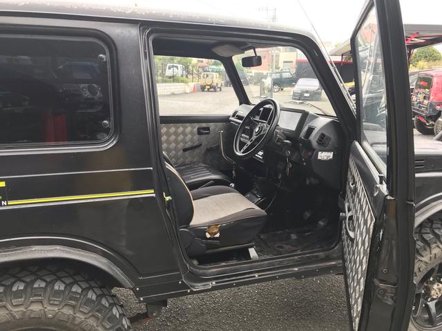 ジムニー スコットリミテッド AC PS 5MT 純正色 社外リーフリフトアップ 改造公認車 R3年小型貨物登録車 社外前後バンパーシシ狩りバンパー大 社外タンクガード 社外マフラー 社外ハンドル 社外AW MTタイヤ 社外ノブ(26枚目)