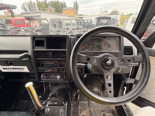 ジムニー スコットリミテッド AC PS 5MT 純正色 社外リーフリフトアップ 改造公認車 R3年小型貨物登録車 社外前後バンパーシシ狩りバンパー大 社外タンクガード 社外マフラー 社外ハンドル 社外AW MTタイヤ 社外ノブ(28枚目)