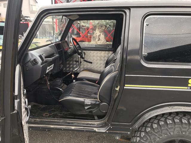 ジムニー スコットリミテッド AC PS 5MT 純正色 社外リーフリフトアップ 改造公認車 R3年小型貨物登録車 社外前後バンパーシシ狩りバンパー大 社外タンクガード 社外マフラー 社外ハンドル 社外AW MTタイヤ 社外ノブ(35枚目)