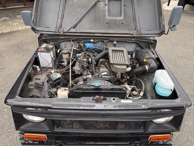 ジムニー スコットリミテッド AC PS 5MT 純正色 社外リーフリフトアップ 改造公認車 R3年小型貨物登録車 社外前後バンパーシシ狩りバンパー大 社外タンクガード 社外マフラー 社外ハンドル 社外AW MTタイヤ 社外ノブ(45枚目)