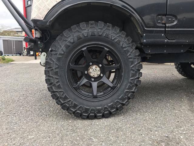 ジムニー スコットリミテッド AC PS 5MT 純正色 社外リーフリフトアップ 改造公認車 R3年小型貨物登録車 社外前後バンパーシシ狩りバンパー大 社外タンクガード 社外マフラー 社外ハンドル 社外AW MTタイヤ 社外ノブ(47枚目)