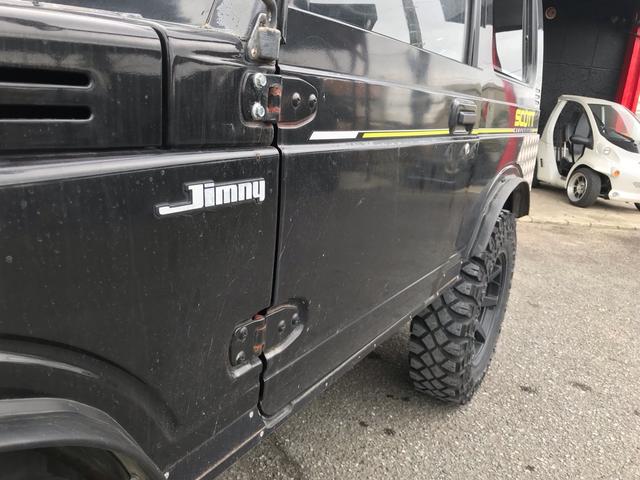 ジムニー スコットリミテッド AC PS 5MT 純正色 社外リーフリフトアップ 改造公認車 R3年小型貨物登録車 社外前後バンパーシシ狩りバンパー大 社外タンクガード 社外マフラー 社外ハンドル 社外AW MTタイヤ 社外ノブ(51枚目)