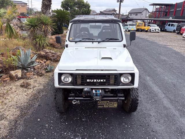 ジムニー CC AC PS 5MT 純正色 社外リーフリフトアップ JA22電動パワステ装着 BRIDEシートフルバケ 外ホイールMTタイヤ 外幌 1型グリル サイドシルガード 外追加メーター MOMOハン ウィンチ(3枚目)