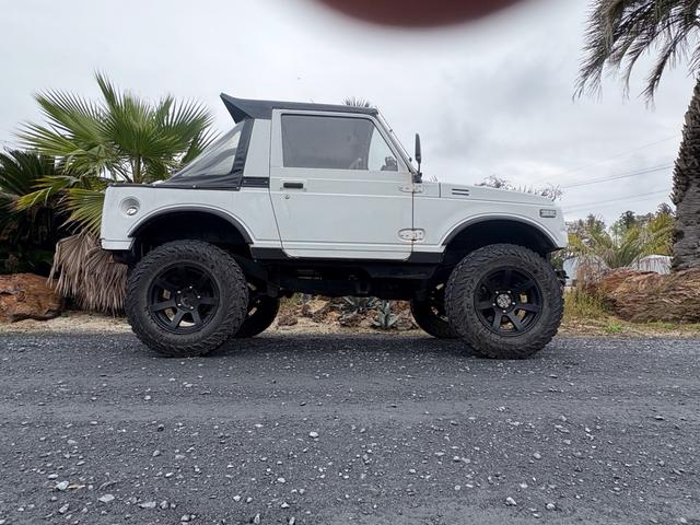 ジムニー CC AC PS 5MT 純正色 社外リーフリフトアップ JA22電動パワステ装着 BRIDEシートフルバケ 外ホイールMTタイヤ 外幌 1型グリル サイドシルガード 外追加メーター MOMOハン ウィンチ(9枚目)