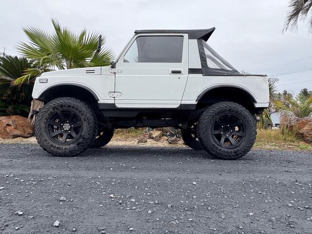 ジムニー CC AC PS 5MT 純正色 社外リーフリフトアップ JA22電動パワステ装着 BRIDEシートフルバケ 外ホイールMTタイヤ 外幌 1型グリル サイドシルガード 外追加メーター MOMOハン ウィンチ(18枚目)