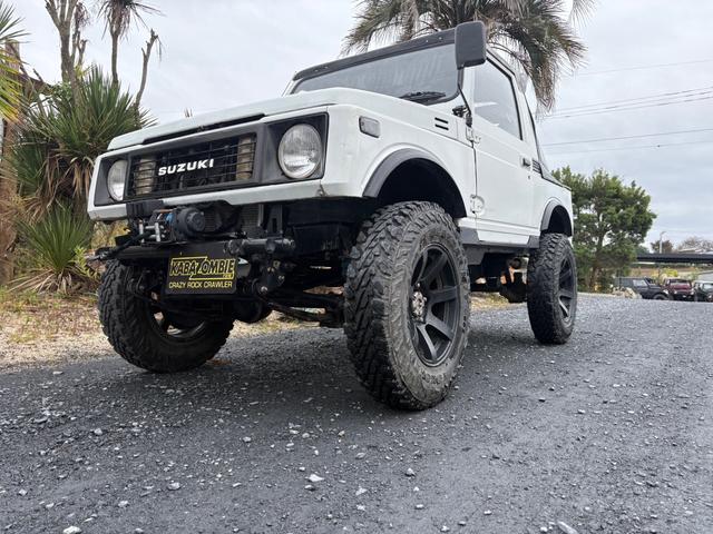 ジムニー CC AC PS 5MT 純正色 社外リーフリフトアップ JA22電動パワステ装着 BRIDEシートフルバケ 外ホイールMTタイヤ 外幌 1型グリル サイドシルガード 外追加メーター MOMOハン ウィンチ(21枚目)