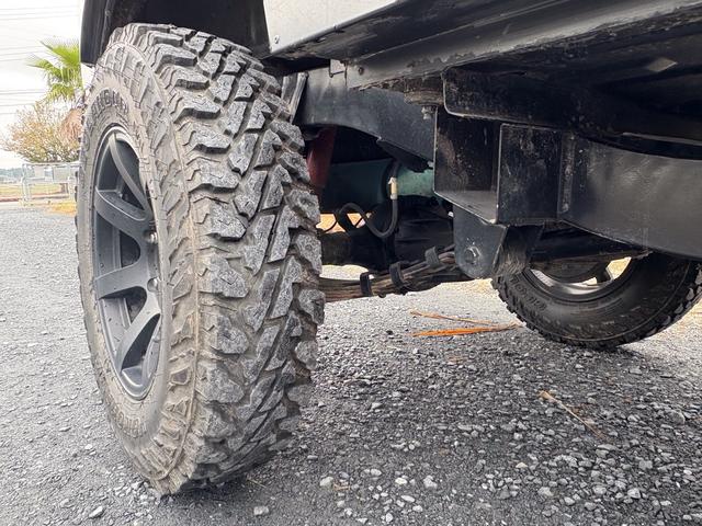 ジムニー CC AC PS 5MT 純正色 社外リーフリフトアップ JA22電動パワステ装着 BRIDEシートフルバケ 外ホイールMTタイヤ 外幌 1型グリル サイドシルガード 外追加メーター MOMOハン ウィンチ(28枚目)