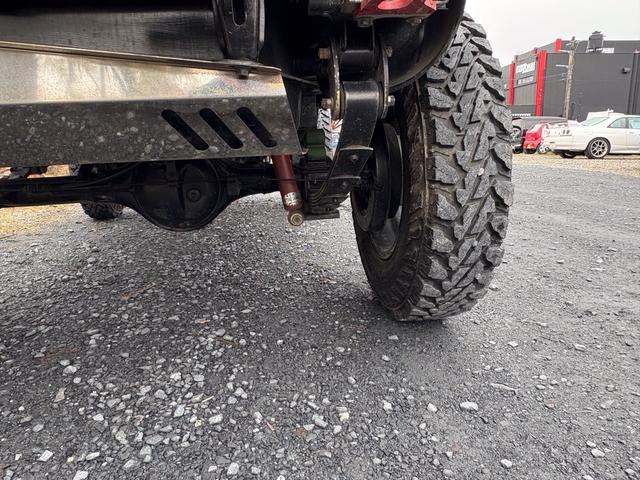 ジムニー CC AC PS 5MT 純正色 社外リーフリフトアップ JA22電動パワステ装着 BRIDEシートフルバケ 外ホイールMTタイヤ 外幌 1型グリル サイドシルガード 外追加メーター MOMOハン ウィンチ(29枚目)