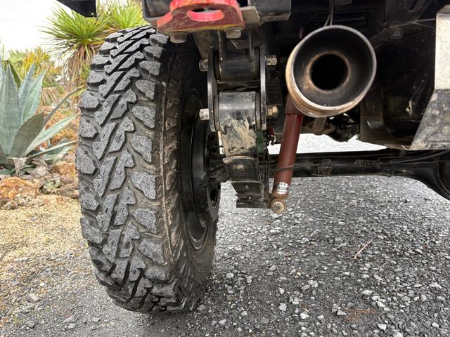 ジムニー CC AC PS 5MT 純正色 社外リーフリフトアップ JA22電動パワステ装着 BRIDEシートフルバケ 外ホイールMTタイヤ 外幌 1型グリル サイドシルガード 外追加メーター MOMOハン ウィンチ(32枚目)