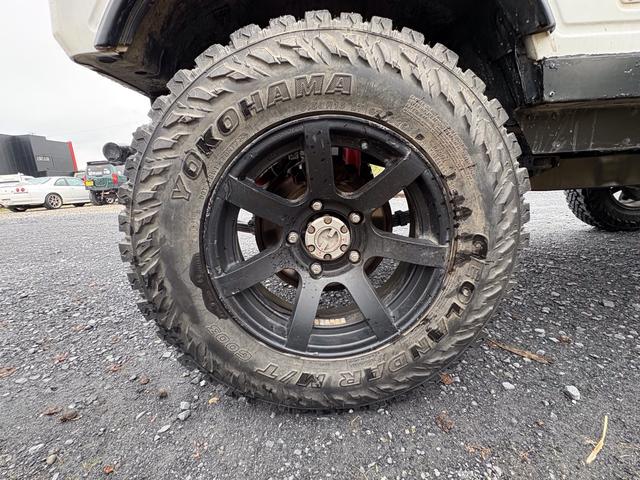 ジムニー CC AC PS 5MT 純正色 社外リーフリフトアップ JA22電動パワステ装着 BRIDEシートフルバケ 外ホイールMTタイヤ 外幌 1型グリル サイドシルガード 外追加メーター MOMOハン ウィンチ(34枚目)