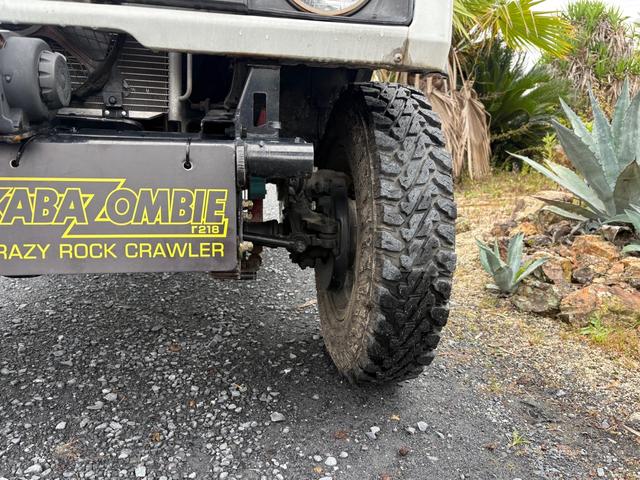 ジムニー CC AC PS 5MT 純正色 社外リーフリフトアップ JA22電動パワステ装着 BRIDEシートフルバケ 外ホイールMTタイヤ 外幌 1型グリル サイドシルガード 外追加メーター MOMOハン ウィンチ(37枚目)