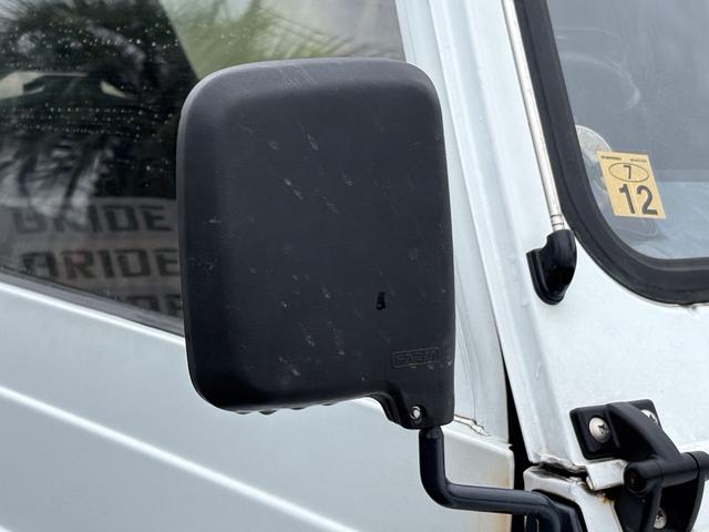 ジムニー CC AC PS 5MT 純正色 社外リーフリフトアップ JA22電動パワステ装着 BRIDEシートフルバケ 外ホイールMTタイヤ 外幌 1型グリル サイドシルガード 外追加メーター MOMOハン ウィンチ(38枚目)